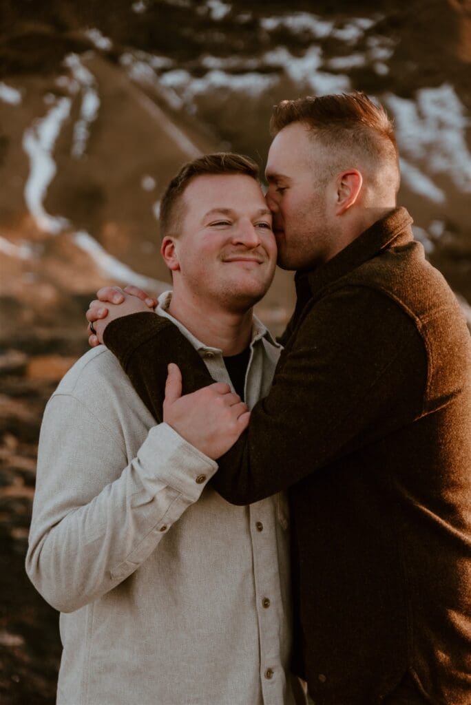 Engagement photoshoot for a gay couple at black sand beach iceland