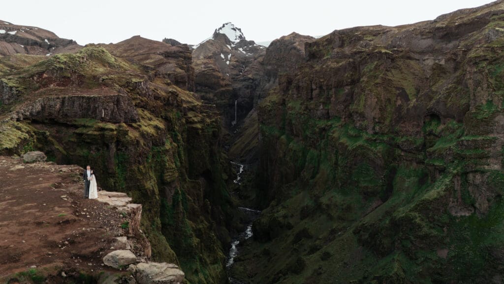 Epic scenery at Múlagljúfur canyon showcasing elopement couple in Iceland