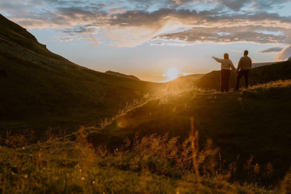 Couples photos during golden hour in a meadow in Iceland